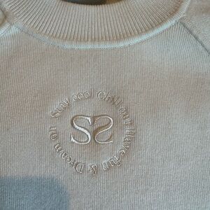 Sandro Cream Crew Neck Sweater with Subtle Logo